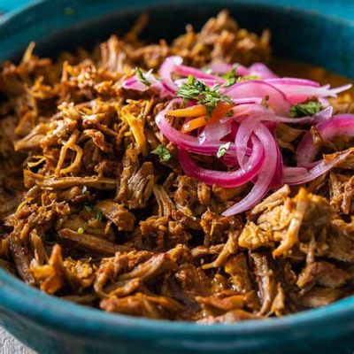   Cochinita Pibil: Une symphonie de saveurs épicées et d'une tendreté inégalée!